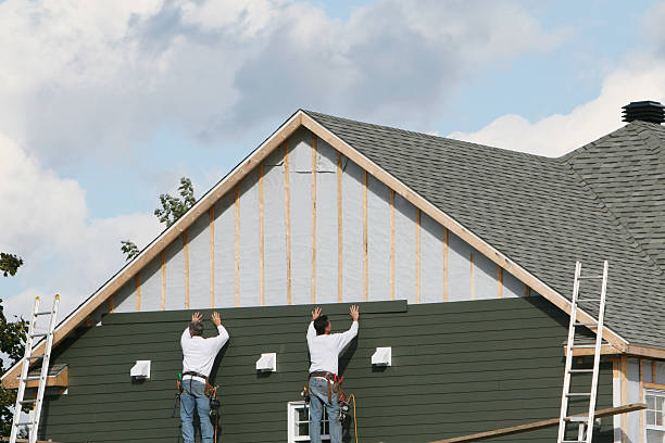 Professional Emergency Siding Repair technician working in Watsontown, PA
